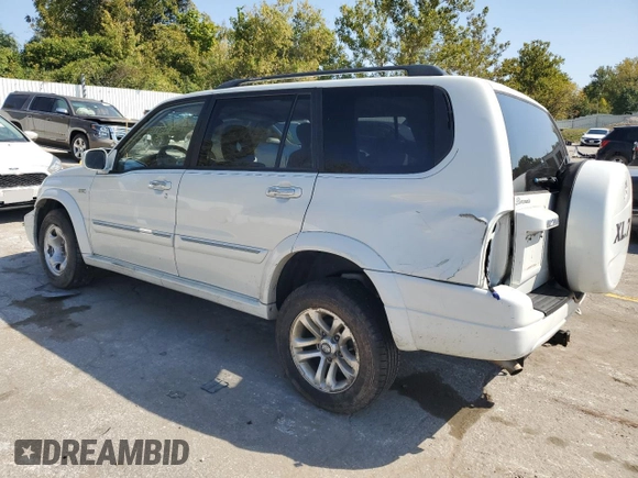2005 Suzuki XL7 LX z VIN JS3TX92VX54100730, wystawiony jako Copart lot #74913534 z przebiegiem 91 838 mil mil oraz Szkoda całkowita • Salvage title. Historia ofert i sprzedaży dostępna na DreamBid. Obrazek 2.