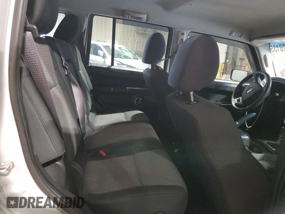 2009 Jeep Commander Sport z VIN 1J8HG48K09C526337, wystawiony jako Copart lot #89026135 z przebiegiem 194 514 mil mil oraz Szkoda całkowita • Salvage title. Historia ofert i sprzedaży dostępna na DreamBid. Obrazek 11.