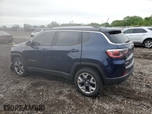 2018 Jeep Compass Limited with VIN 3C4NJDCB4JT128687, listed as a Copart auction lot 57648245 with 136,455 mi miles and Salvage title. Bid and sale history available at DreamBid. Image 2.