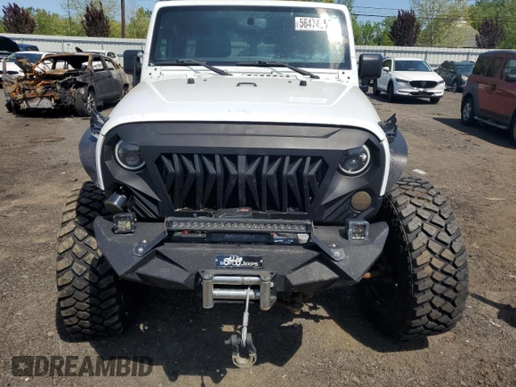 2013 Jeep Wrangler Unlimited Rubicon with VIN 1C4HJWFG2DL549064, listed as a Copart auction lot 56474055 with 148,217 mi miles and Salvage title. Bid and sale history available at DreamBid. Image 5.
