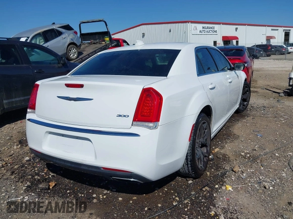 2016 Chrysler 300 Limited with VIN 2C3CCAAG2GH211782, listed as a IAAI auction lot 41718191 with 127,836 mi miles. Bid and sale history available at carsss.com. Image 4.