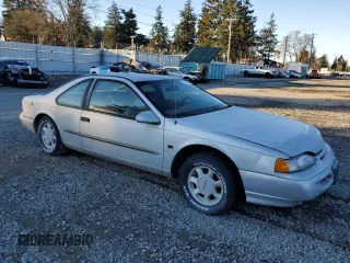 1995 Ford Thunderbird LX with VIN 1FALP62W5SH214974, listed as a Copart auction lot 42856995 with 150,454 mi miles and Clean Title. Bid and sale history available at DreamBid. Image 4.
