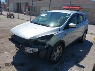 2013 Ford Escape SEL z VIN 1FMCU9H93DUA34811, wystawiony jako IAAI lot #42227559 z przebiegiem 126 495 mil mil oraz . Historia ofert i sprzedaży dostępna na DreamBid. Obrazek 6.