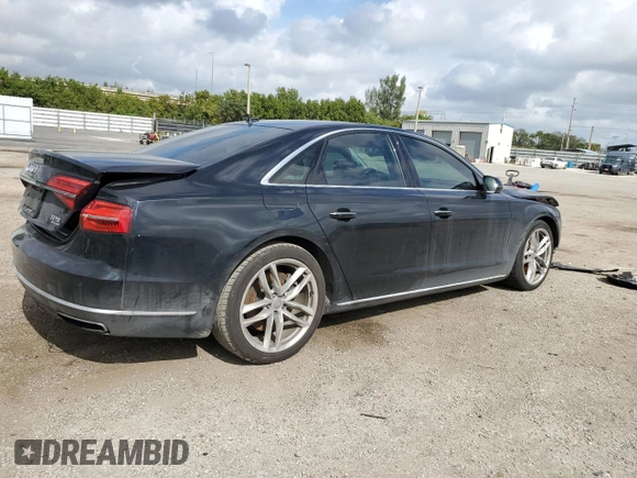 2015 Audi A8 4.0T with VIN WAUJ2AFD5FN013267, listed as a Copart auction lot 39065654 with 64,541 mi miles and . Bid and sale history available at DreamBid. Image 3.