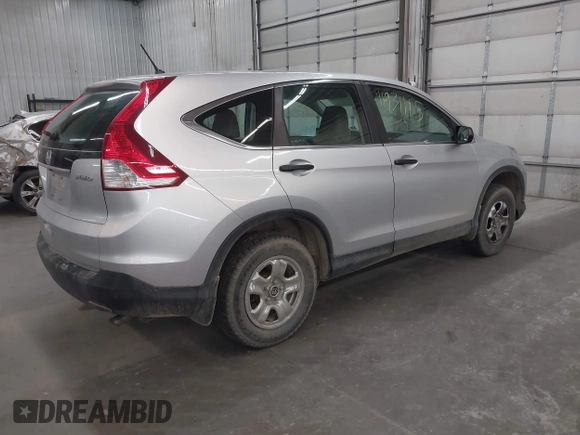 2014 Honda CR-V LX with VIN 2HKRM4H38EH723171, listed as a IAAI auction lot 41931115 with 132,417 mi miles and . Bid and sale history available at carsss.com. Image 4.
