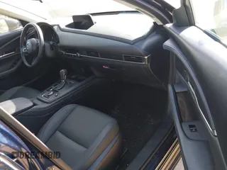 2023 Mazda CX-30 S Select with VIN 3MVDMBBM4PM558831, listed as a IAAI auction lot 42432750 with 12,468 mi miles and . Bid and sale history available at DreamBid. Image 5.