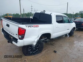 2019 Toyota Tacoma SR z VIN 3TMCZ5AN0KM232852, wystawiony jako IAAI lot #42178269 z przebiegiem 71 545 mil mil oraz . Historia ofert i sprzedaży dostępna na DreamBid. Obrazek 4.