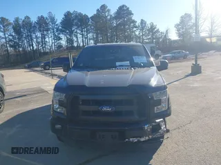2015 Ford F-150 XLT with VIN 1FTEW1E86FFC00959, listed as a IAAI auction lot 41581711 with 130,298 mi miles. Bid and sale history available at carsss.com. Image 12.