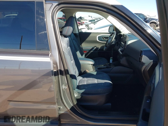 2024 Ford Bronco Sport Heritage with VIN 3FMCR9G64RRE03926, listed as a IAAI auction lot 41641234 with 7,372 mi miles and . Bid and sale history available at DreamBid. Image 5.