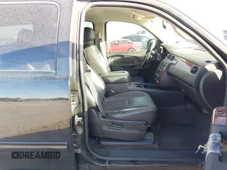 2013 Chevrolet Tahoe LS with VIN 1GNSCAE03DR193235, listed as a IAAI auction lot 41604766 with 204,455 mi miles and . Bid and sale history available at DreamBid. Image 5.