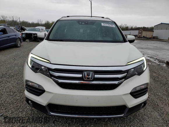 2017 Honda Pilot Elite with VIN 5FNYF6H04HB056917, listed as a Copart auction lot 51770735 with 88,762 mi miles and Salvage Title. Bid and sale history available at DreamBid. Image 5.