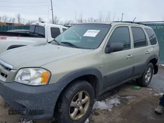 2005 Mazda Tribute i with VIN 4F2YZ02Z35KM57658, listed as a IAAI auction lot 41547562 with 131,303 mi miles and . Bid and sale history available at carsss.com. Image 2.