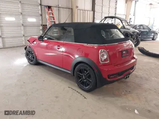 2014 MINI Cooper Convertible S with VIN WMWZP3C59ET298305, listed as a IAAI auction lot 41679657 with 77,736 mi miles. Bid and sale history available at carsss.com. Image 3.