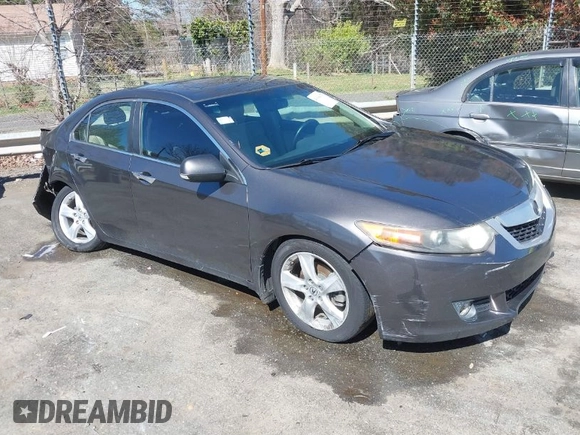 2009 Acura TSX with VIN JH4CU26659C027813, listed as a IAAI auction lot 41848415 with 216,257 mi miles. Bid and sale history available at carsss.com. Image 1.