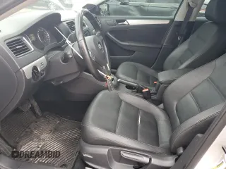 2012 Volkswagen Jetta TDI w/Premium & Nav z VIN 3VWLL7AJ8CM365576, wystawiony jako Copart lot #56728245 z przebiegiem 102 088 mil mil oraz Szkoda całkowita • Salvage title. Historia ofert i sprzedaży dostępna na DreamBid. Obrazek 7.
