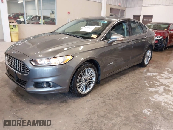 2014 Ford Fusion SE Hybrid with VIN 3FA6P0LU5ER310629, listed as a IAAI auction lot 41941852 with 53,739 mi miles. Bid and sale history available at carsss.com. Image 2.
