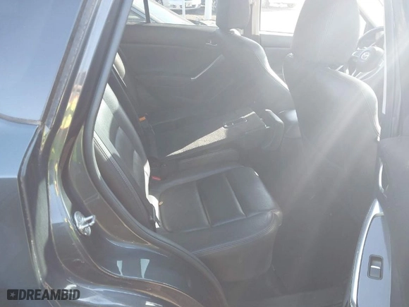 2016 Mazda CX-5 Grand Touring with VIN JM3KE4DY5G0843355, listed as a IAAI auction lot 41775499 with NaN miles. Bid and sale history available at carsss.com. Image 8.