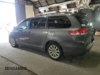 2013 Toyota Sienna LE with VIN 5TDJK3DCXDS059838, listed as a Copart auction lot 52107215 with 142,582 mi miles and Clean Title. Bid and sale history available at carsss.com. Image 2.