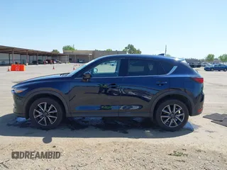 2018 Mazda CX-5 Grand Touring с VIN JM3KFBDM6J0326684, выставлен на аукционе IAAI как лот 42087646 с пробегом 111 192 миль миль и . История ставок и продаж доступна на DreamBid. Изображение 14.
