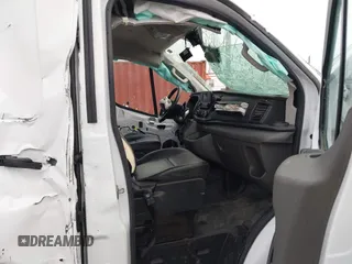 2023 Ford Transit Cargo with VIN 1FTYE1Y82PKB92413, listed as a IAAI auction lot 41702808 with 20,144 mi miles and . Bid and sale history available at DreamBid. Image 5.