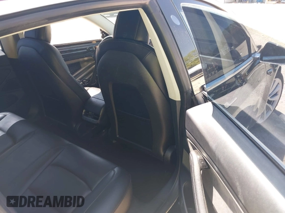 2018 Tesla Model 3 Long Range Battery with VIN 5YJ3E1EAXJF019907, listed as a IAAI auction lot 41995969 with Not Provided miles and . Bid and sale history available at DreamBid. Image 8.