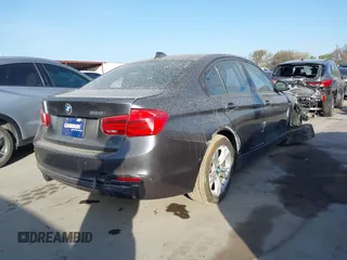 2016 BMW 3 Series 328i with VIN WBA8E9G56GNT82443, listed as a IAAI auction lot 41812424 with 56,965 mi miles. Bid and sale history available at carsss.com. Image 4.