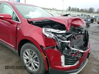 2021 Cadillac XT5 AWD Premium Luxury z VIN 1GYKNDRS2MZ151150, wystawiony jako Copart lot #47026545 z przebiegiem 26 686 mil mil oraz Szkoda całkowita • Salvage title. Historia ofert i sprzedaży dostępna na DreamBid. Obrazek 12.