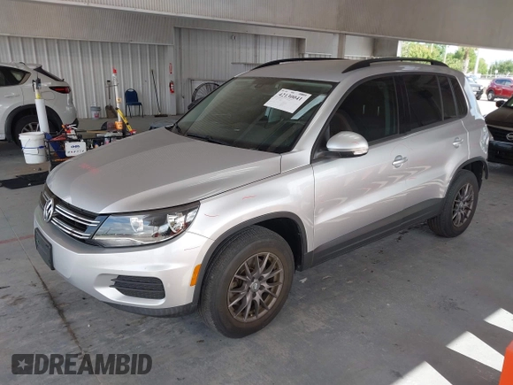 2016 Volkswagen Tiguan S with VIN WVGBV7AX2GW535784, listed as a IAAI auction lot 42130041 with 35,718 mi miles and . Bid and sale history available at DreamBid. Image 18.