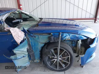 2017 Ford Mustang EcoBoost z VIN 1FA6P8TH1H5239681, wystawiony jako IAAI lot #39953332 z przebiegiem 102 035 mil mil oraz . Historia ofert i sprzedaży dostępna na DreamBid. Obrazek 6.