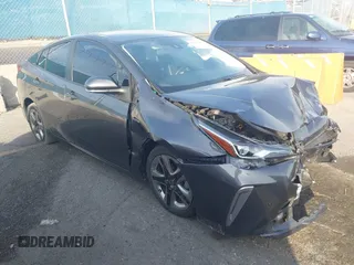 2022 Toyota Prius L Eco with VIN JTDKAMFU2N3168011, listed as a IAAI auction lot 41602356 with 34,977 mi miles and . Bid and sale history available at DreamBid. Image 1.