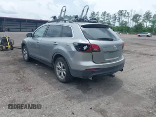 2015 Mazda CX-9 Touring z VIN JM3TB2CA1F0455916, wystawiony jako IAAI lot #42226924 z przebiegiem 157 643 mil mil oraz . Historia ofert i sprzedaży dostępna na DreamBid. Obrazek 3.