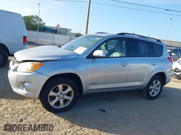 2009 Toyota RAV4 Ltd with VIN JTMZK31VX9D001773, listed as a IAAI auction lot 41941159 with 129,573 mi miles. Bid and sale history available at carsss.com. Image 14.