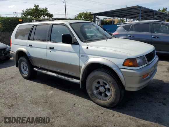 1998 Mitsubishi Montero z VIN JA4LS31P1WP029117, wystawiony jako Copart lot #72069334 z przebiegiem 172 069 mil mil oraz Szkody całkowita. Historia ofert i sprzedaży dostępna na DreamBid. Obrazek 4.