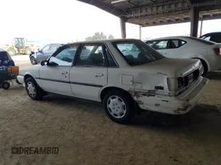 1991 Toyota Camry DLX z VIN 4T1SV21E1MU450315, wystawiony jako Copart lot #42772935 z przebiegiem 125 494 mil mil oraz Szkoda całkowita • Salvage title. Historia ofert i sprzedaży dostępna na DreamBid. Obrazek 2.