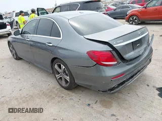 2018 Mercedes-Benz E 300 with VIN WDDZF4JB7JA357139, listed as a IAAI auction lot 42065511 with 54,812 mi miles and . Bid and sale history available at DreamBid. Image 3.