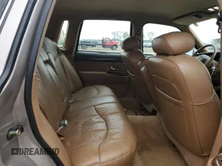 1995 Lincoln Town Car Executive z VIN 1LNLM81W4SY748883, wystawiony jako Copart lot #51976375 z przebiegiem 123 506 mil mil oraz Szkody całkowita. Historia ofert i sprzedaży dostępna na DreamBid. Obrazek 10.