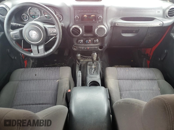 2012 Jeep Wrangler Unlimited Sport z VIN 1C4BJWDG0CL272440, wystawiony jako Copart lot #56044005 z przebiegiem 143 117 mil mil oraz Szkoda całkowita • Salvage title. Historia ofert i sprzedaży dostępna na DreamBid. Obrazek 8.