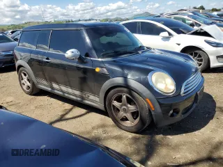 2010 MINI Clubman z VIN WMWML3C59ATX37695, wystawiony jako Copart lot #50553525 z przebiegiem 122 247 mil mil oraz Szkoda całkowita • Salvage title. Historia ofert i sprzedaży dostępna na DreamBid. Obrazek 4.