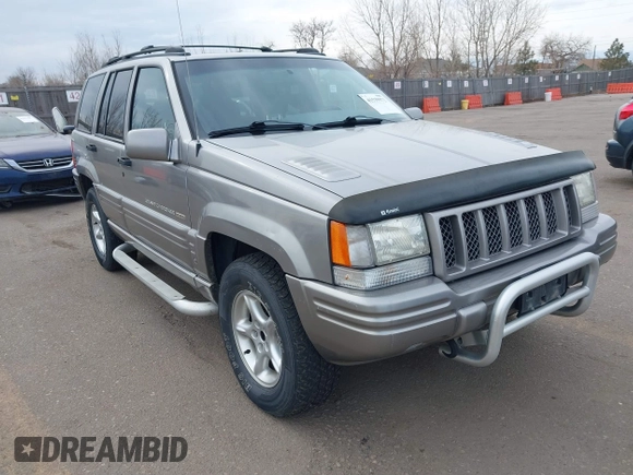 1998 Jeep Grand Cherokee Limited with VIN 1J4GZ88Z6WC307986, listed as a IAAI auction lot 41539972 with 150,652 mi miles. Bid and sale history available at carsss.com. Image 1.
