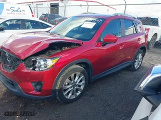 2014 Mazda CX-5 Grand Touring with VIN JM3KE2DY8E0373064, listed as a IAAI auction lot 41683791 with 186,970 mi miles. Bid and sale history available at carsss.com. Image 2.