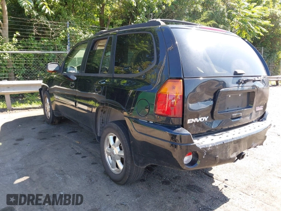 2005 GMC Envoy SLE with VIN 1GKDS13S452208252, listed as a IAAI auction lot 42357457 with 197,419 mi miles and . Bid and sale history available at DreamBid. Image 3.