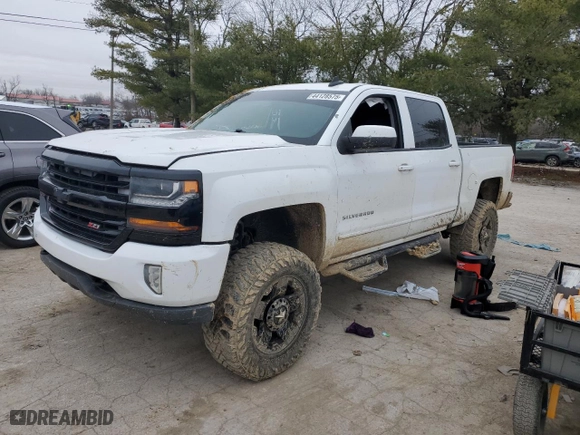 2016 Chevrolet Silverado 1500 LT with VIN 3GCUKREC9GG132988, listed as a Copart auction lot 44128575 with 124,764 mi miles and Salvage Title. Bid and sale history available at carsss.com. Image 1.