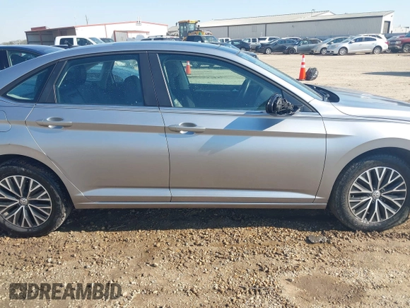 2020 Volkswagen Jetta S z VIN 3VWCB7BU5LM035468, wystawiony jako IAAI lot #41785899 z przebiegiem 69 058 mil mil oraz . Historia ofert i sprzedaży dostępna na DreamBid. Obrazek 13.