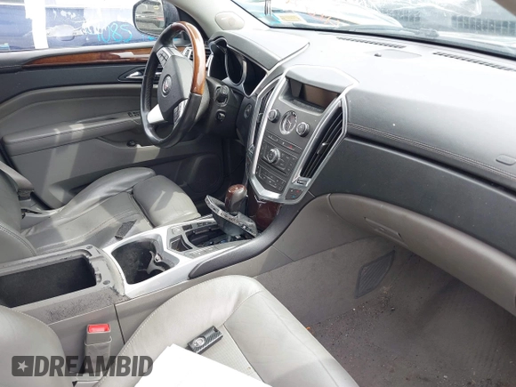 2011 Cadillac SRX Luxury Collection with VIN 3GYFNDEYXBS556758, listed as a IAAI auction lot 42054672 with 151,648 mi miles. Bid and sale history available at carsss.com. Image 5.
