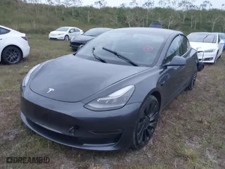 2021 Tesla Model 3 Performance with VIN 5YJ3E1EC9MF015708, listed as a IAAI auction lot 40545406 with 1 mi miles. Bid and sale history available at carsss.com. Image 18.