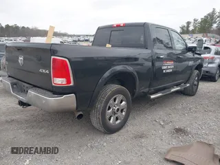 2016 Ram 2500 Laramie with VIN 3C6UR5FL3GG387758, listed as a IAAI auction lot 41522575 with 322,434 mi miles. Bid and sale history available at carsss.com. Image 4.