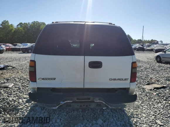 2000 Chevrolet Tahoe LS with VIN 1GNEK13T2YJ203352, listed as a Copart auction lot 58077765 with 314,293 mi miles and Salvage title. Bid and sale history available at DreamBid. Image 6.
