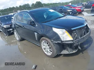2014 Cadillac SRX Performance Collection with VIN 3GYFNFE38ES656510, listed as a IAAI auction lot 42336472 with 125,269 mi miles and . Bid and sale history available at DreamBid. Image 1.