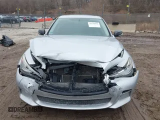 2014 Infiniti Q50 Hybrid Sport with VIN JN1AV7AR3EM703431, listed as a IAAI auction lot 41710414 with 213,611 mi miles. Bid and sale history available at carsss.com. Image 12.