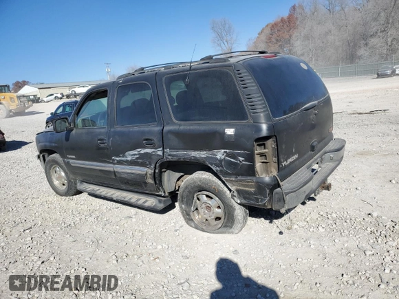 2000 GMC Yukon SLE with VIN 1GKEK13T3YJ107596, listed as a Copart auction lot 83326244 with 293,602 mi miles and Salvage Title. Bid and sale history available at carsss.com. Image 2.